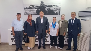 BAŞKAN TAVLI, AVRUPA VE DÜNYA ŞAMPİYONU MÜNEVVERE'Yİ AĞIRLADI