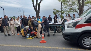 KARŞIDAN KARŞIYA GEÇMEK İSTEYEN KADINA MOTOSİKLET ÇARPTI