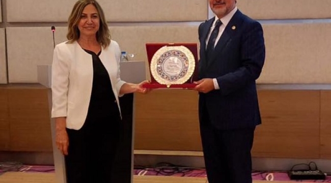 MİLLETVEKİLİ HAMARAT'A TAIMA'DAN TEŞEKKÜR PLAKETİ